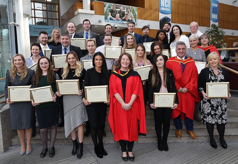 Students receiving their Dean's Awards at NCI