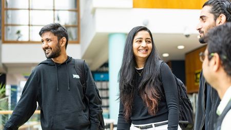 NCI students inside the NCI atrium