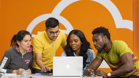 Computing students working in the Cloud Competency Centre on NCI campus