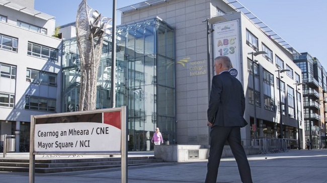 Man walking outside NCI campus