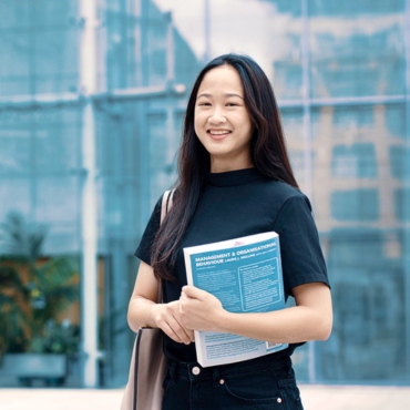 International Student Holding Book