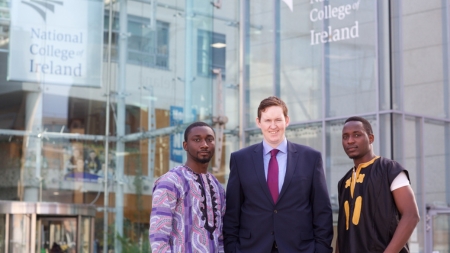 Image of International Students and Regional Manager in front of NCI