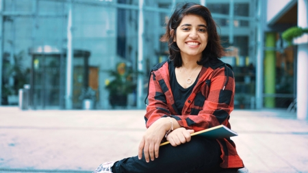 Image of International Student In front of NCI