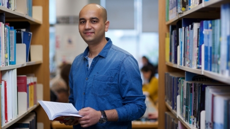 Image of International Student in the library