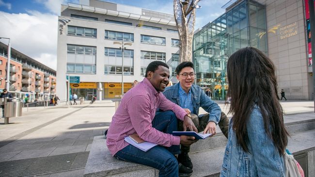 Students in front of nci entrance