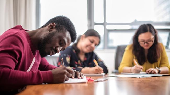 NCI students studying in a classroom