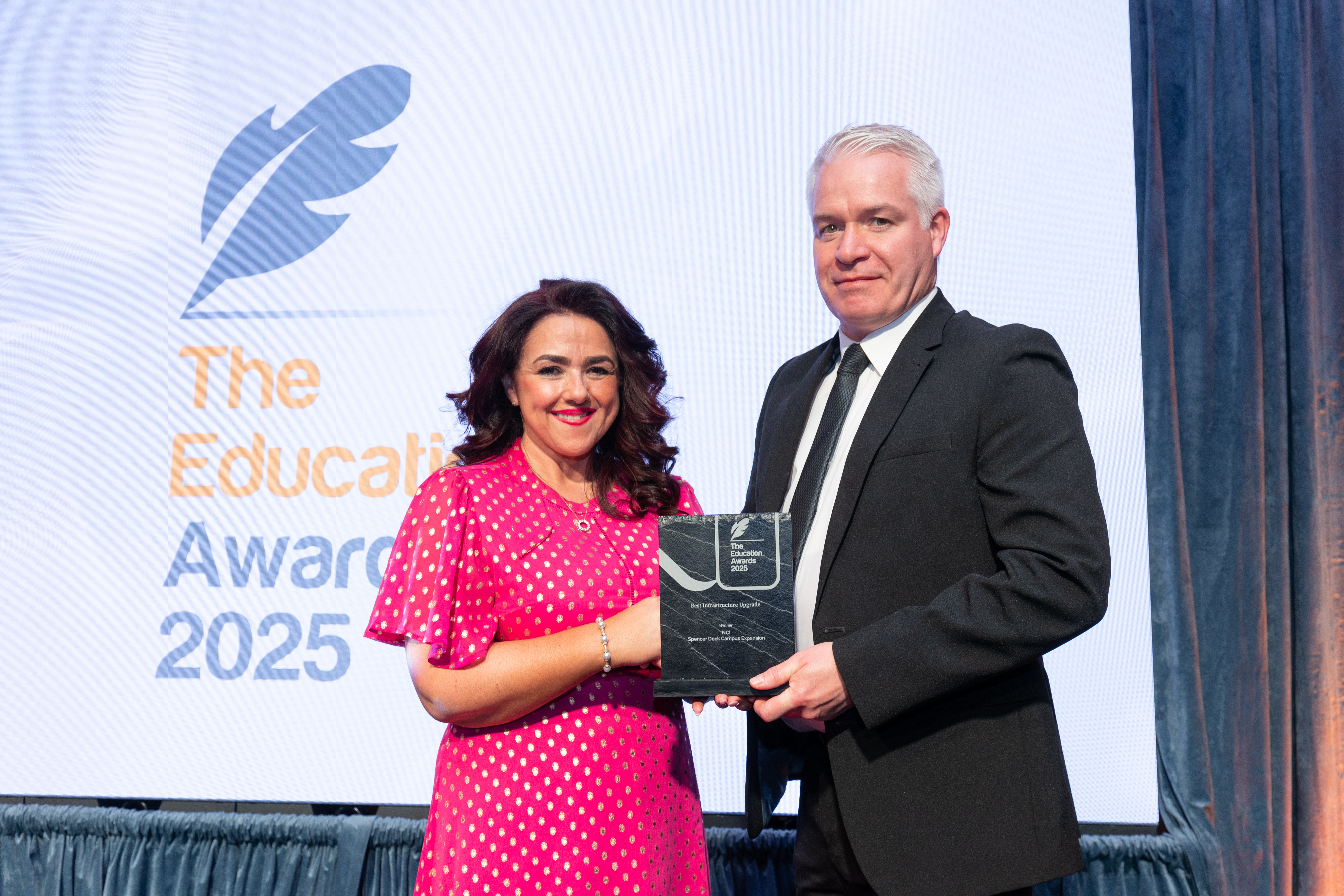 Robert Ward accepting NCI Spencer Dock Best Infrastructure Award at Education Awards 2025