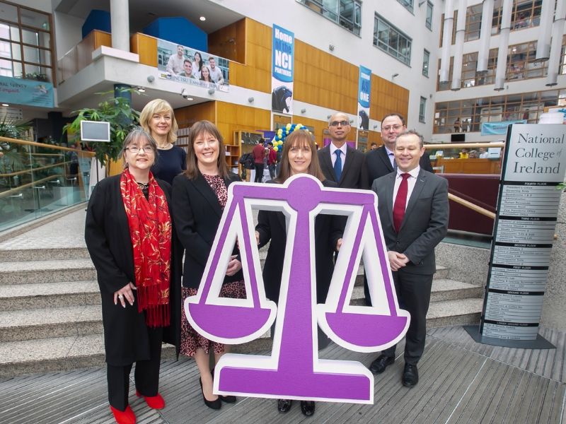NCI President Gina Quin with members of NCI faculty, promoting the Athena SWAN Charter